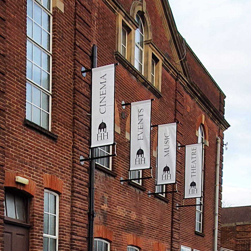 4 large hanging pvc flags printed and installed at Haslemere Hall