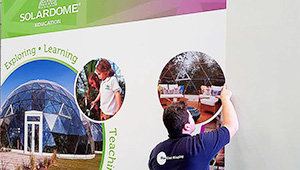 Bluedot Display installing vinyl wall graphics for Soladome