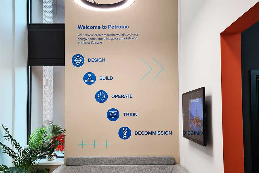 Seamless Polycril colour vinyl wall graphics produced by Bluedot Display for the Petrofac office reception area in Woking