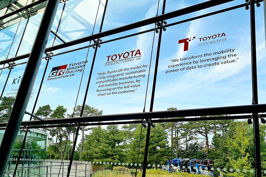 Front windows of Toyota GB in Epsom with colour graphics by Bluedot Display