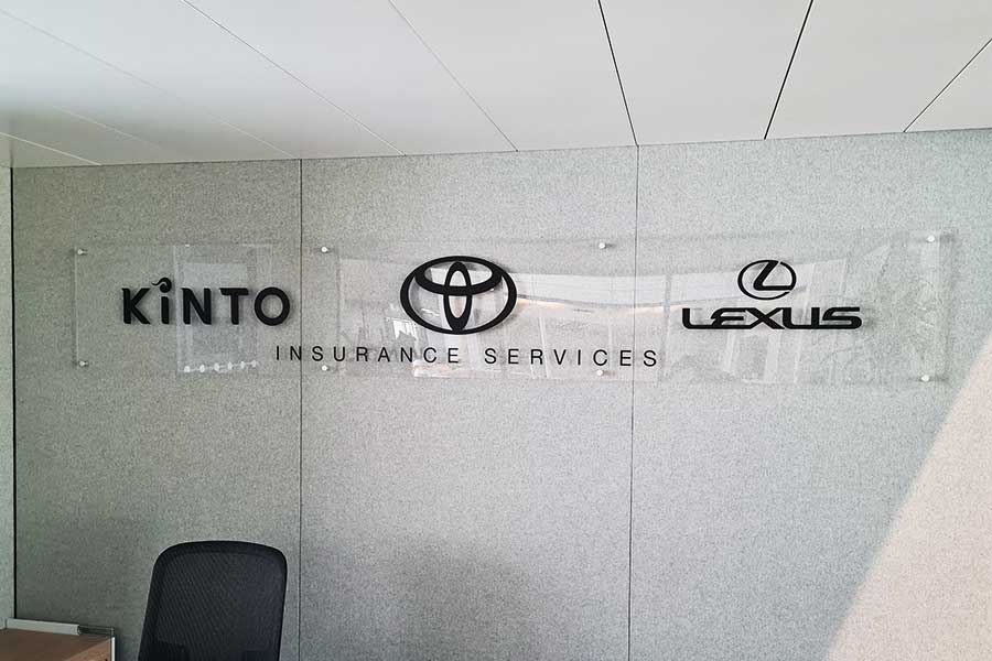 Clear acrylic stand off signs with Toyota and Lexus branding produced and installed by Bluedot Display