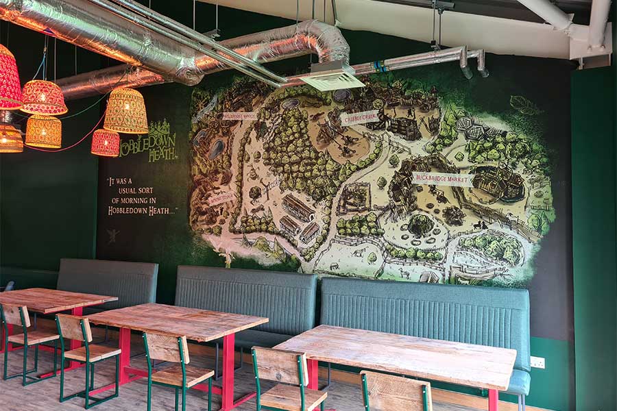 Large vinyl self adhesive wall map of Hobbledown Heath adventure park printed and installed by Bluedot Display