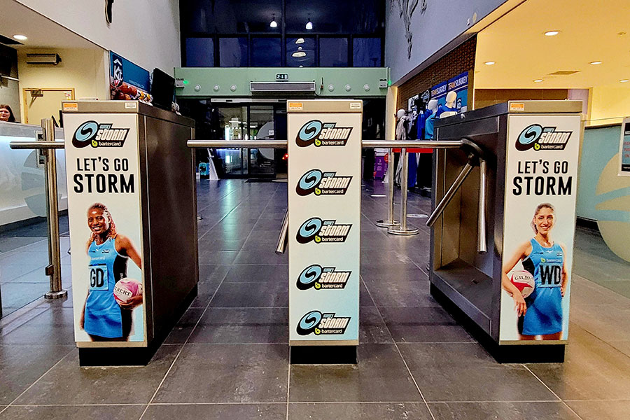 Surrey Storm Netball Team printed vinyl graphics for the turnstiles printed and installed by Bluedot Display