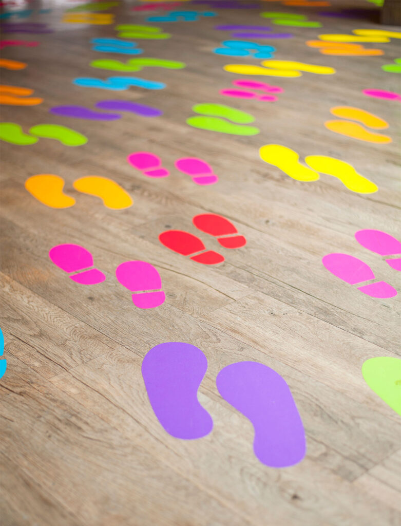 Vinyl floor sticker foot prints are a fun way to direct people in retail spaces