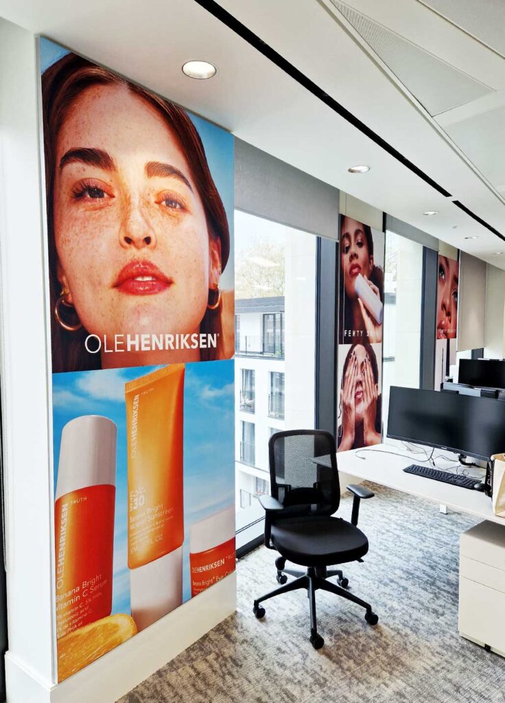 Large wall mounted stretch fabric displays created by Bluedot display for an office interior