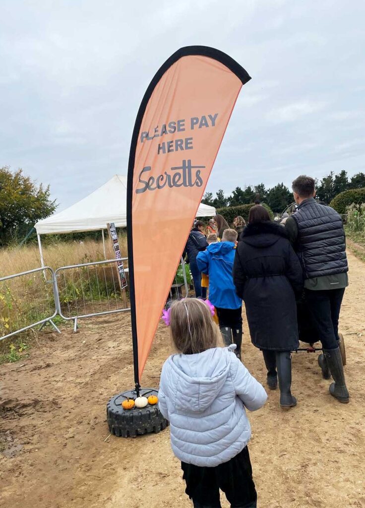 Feather flag created for Secretts Garden Centre in Godalming Surrey