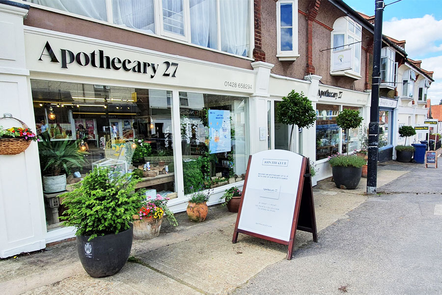 High street shop with eye-catching signage and pavements boards stands out from other shops