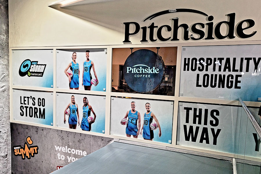 Large window posters created for the Pitchside cafe at Surrey Sports Pk