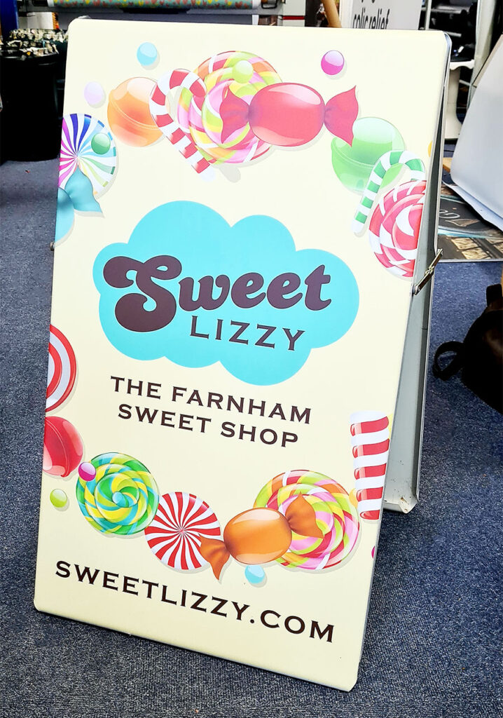 Eye-catching colourful pavement sign created for Sweet Lizzy sweet shop by Bluedot Display