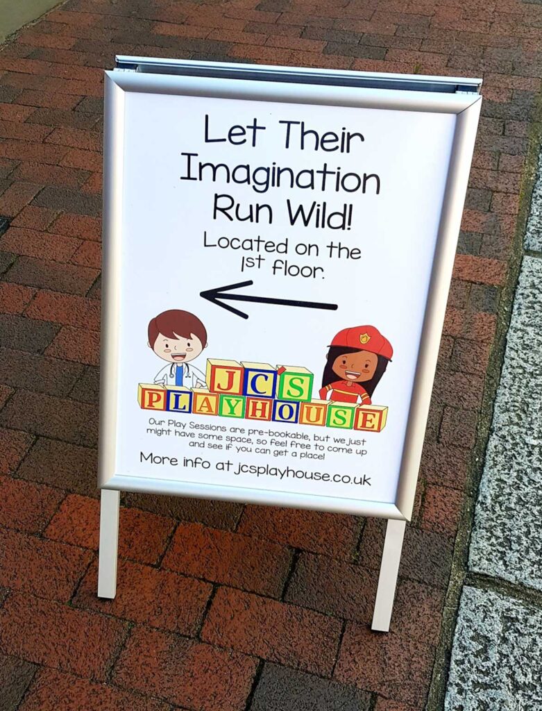 Clip frame pavement signs with posters printed by Bluedot Display for JCS Playhouse