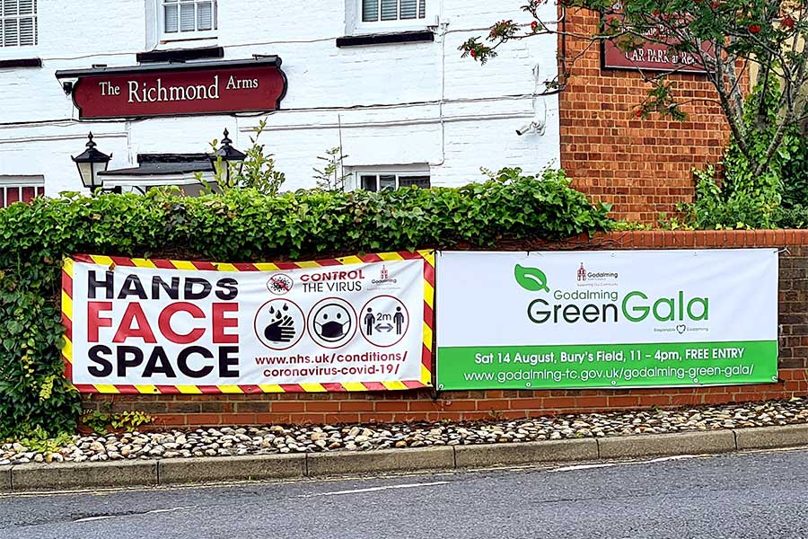 pvc hanging banners outside the Richmond Arms created for Godalming Council Green Gala event by Bluedot Display