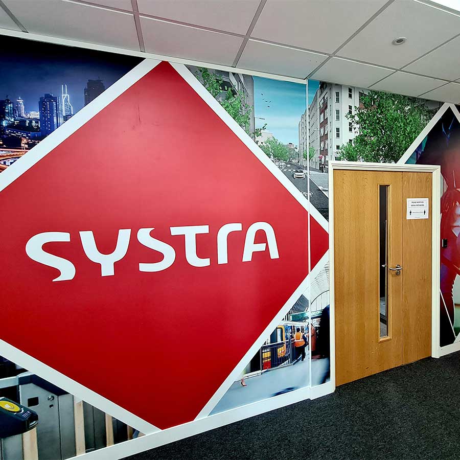 Large full vinyl wall wraps printed and installed for Systra at their offices in Woking by Bluedot Display